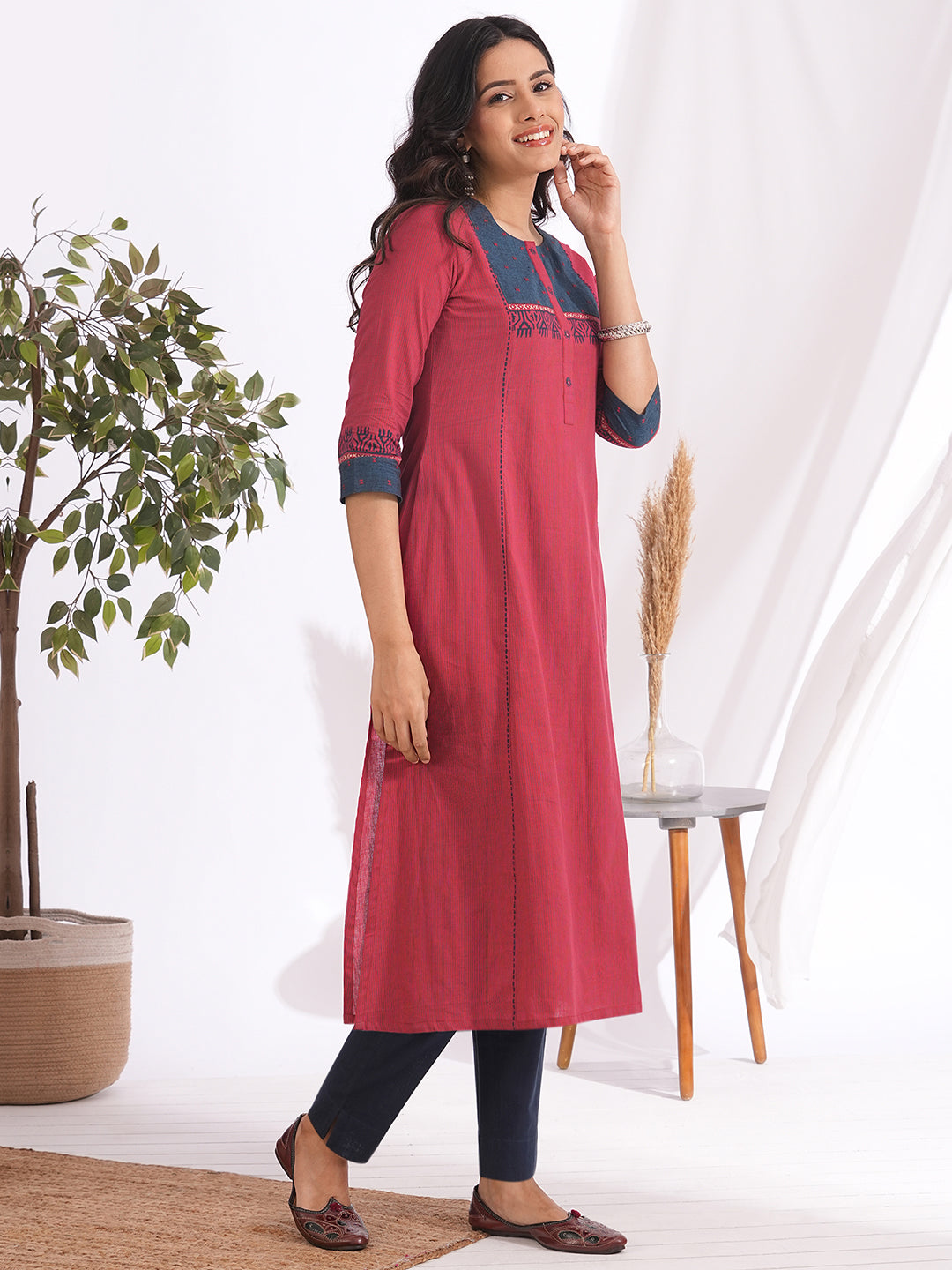 Pocketed A-line kurta in woven stripe cotton with a dobby trim, block print and handwork detailing