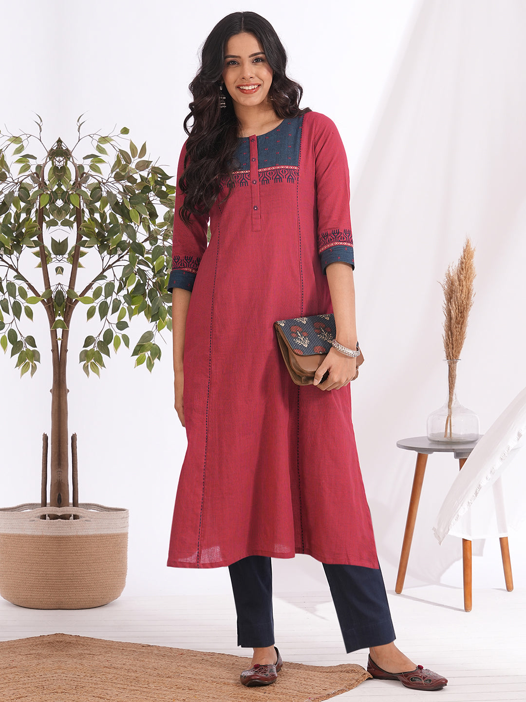 Pocketed A-line kurta in woven stripe cotton with a dobby trim, block print and handwork detailing