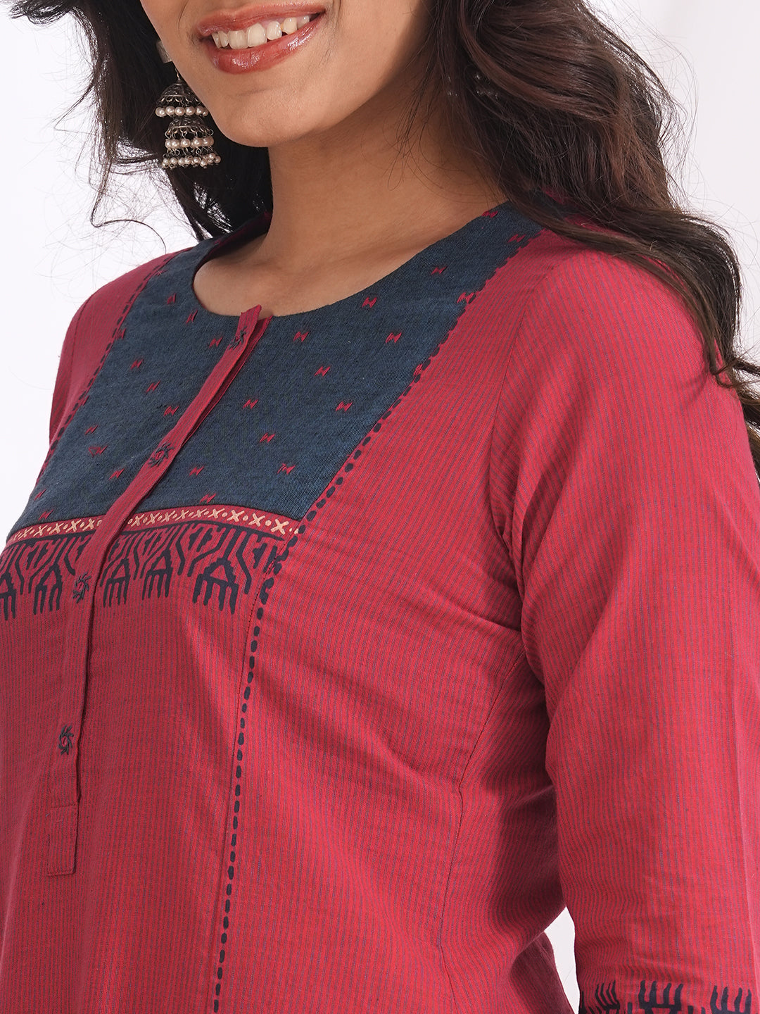 Pocketed A-line kurta in woven stripe cotton with a dobby trim, block print and handwork detailing