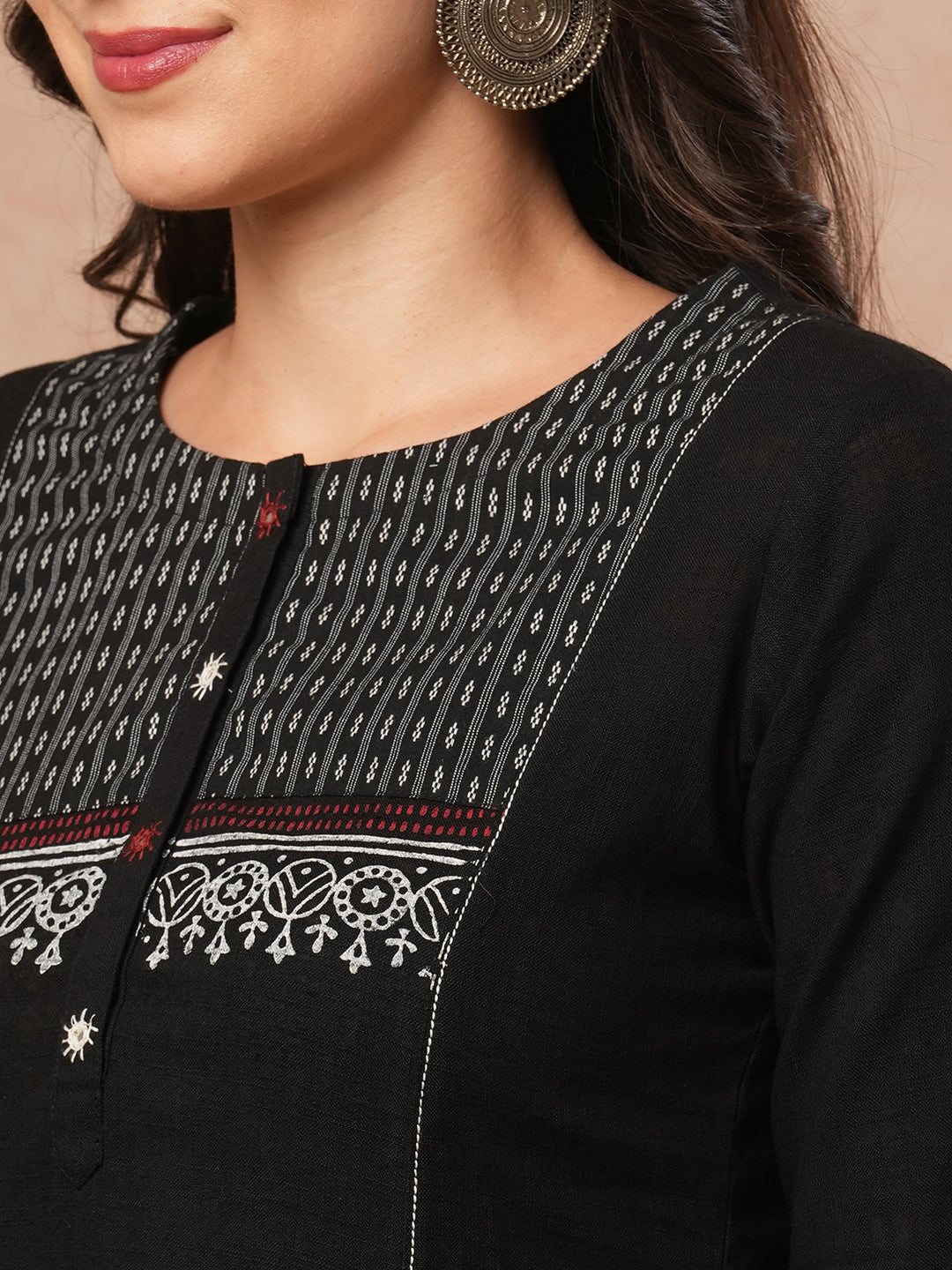 Pocketed A-line kurta in cotton slurb fabric with block print and handwork detailing.