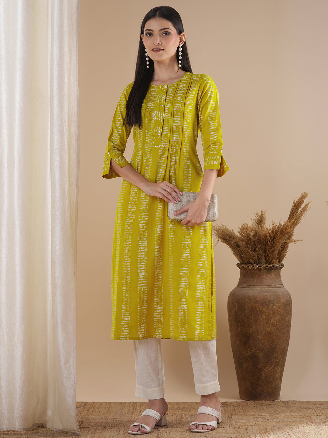 Straight fit kurta with a broad mirror work placket and tucks between stripes and broad sleeve cuff