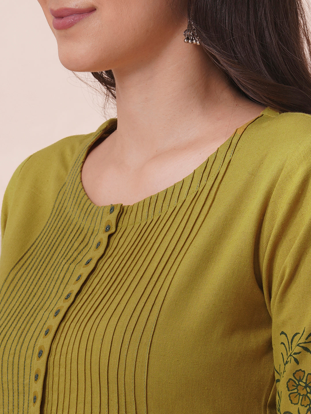 Straight fit kurta with pintucks and block printed sleeves and placket highlighted with mirrors.