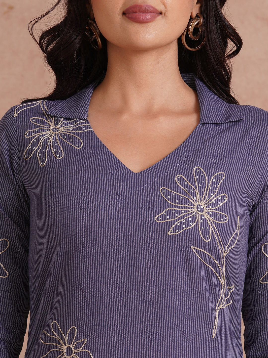 Straight fit collared kurta with placement cord work embroidery with hand sequins.