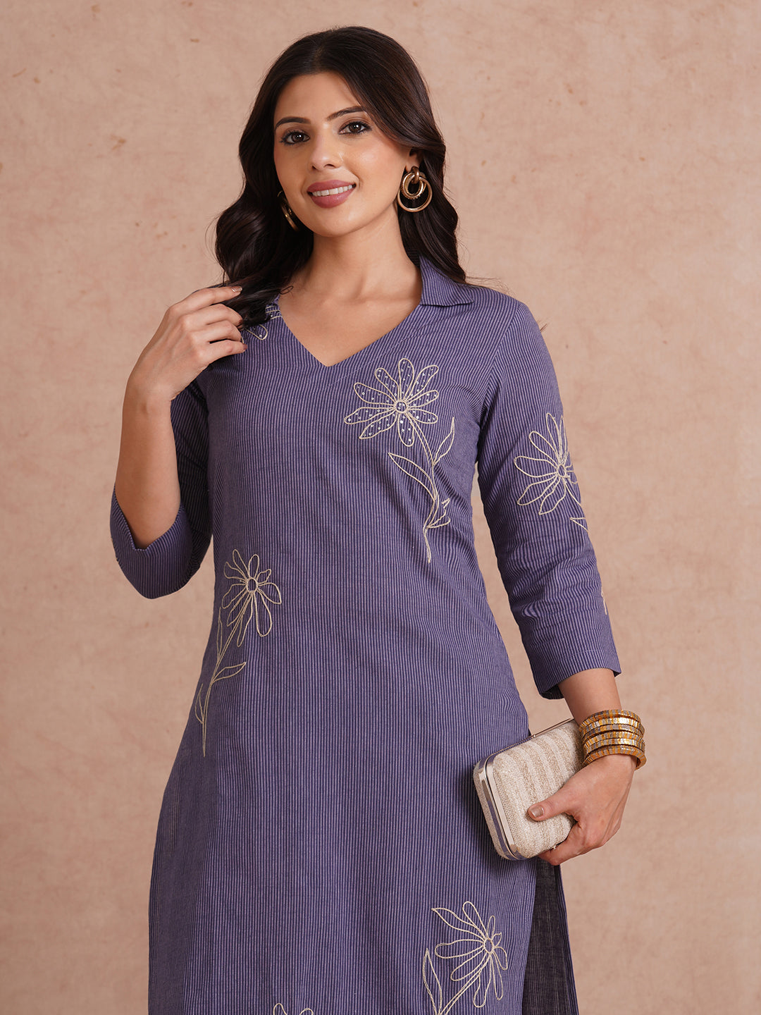 Straight fit collared kurta with placement cord work embroidery with hand sequins.