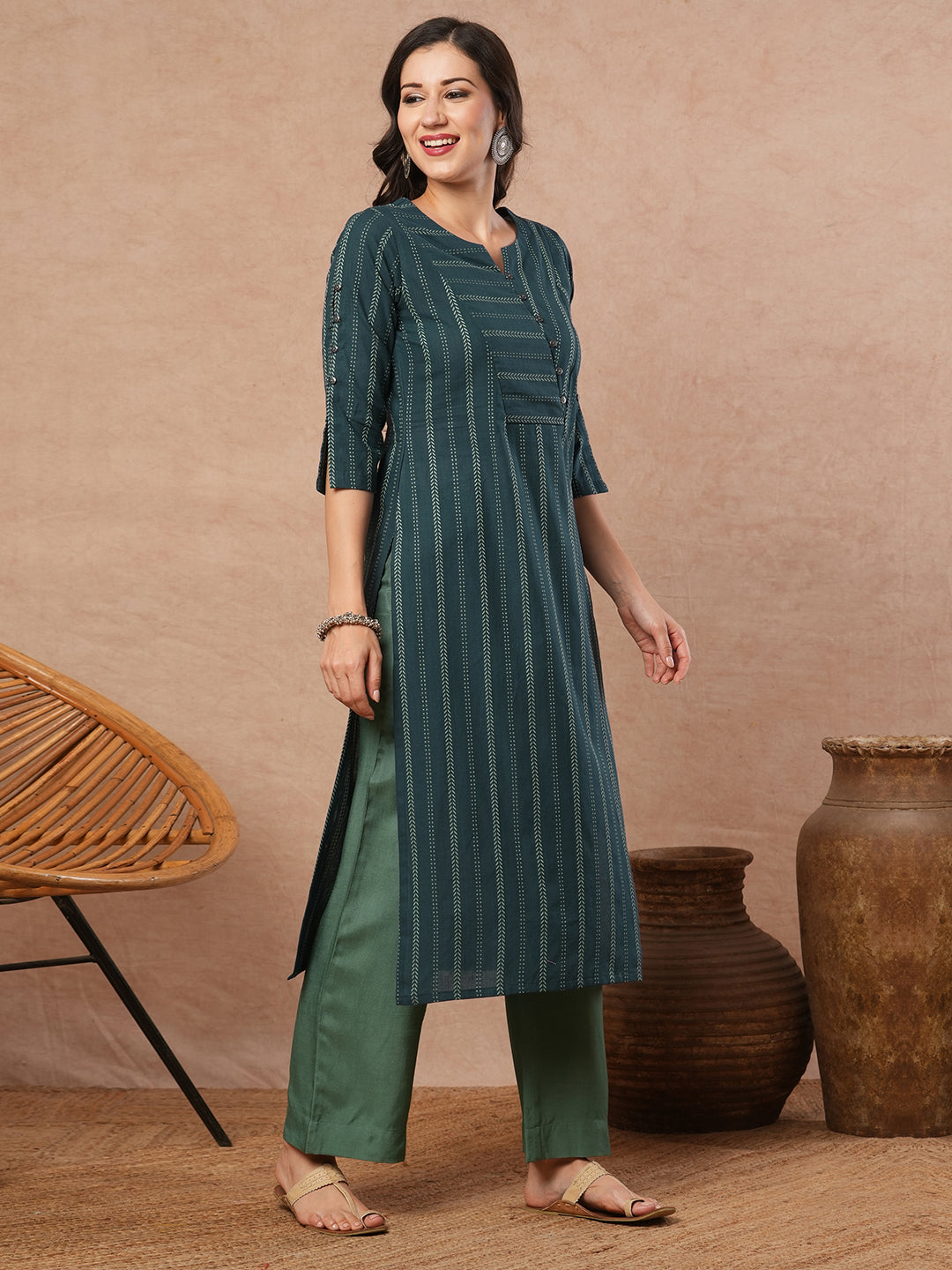 A dobby stripe straight fit kurta with stripe manipulation on the overlapping yoke.