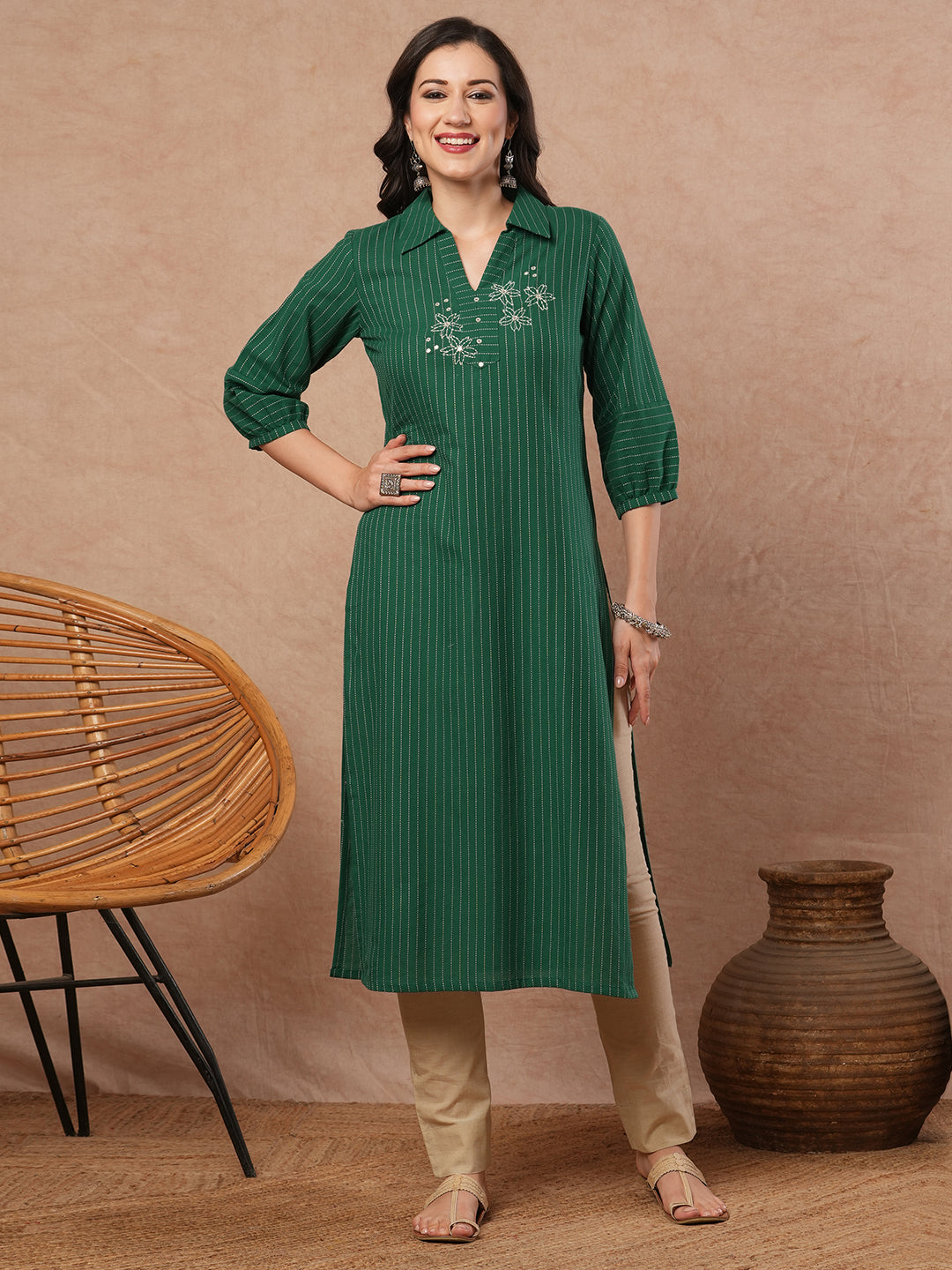 Straight fit kurta with collar and gathered sleeves with handwork on kantha stripe fabric.
