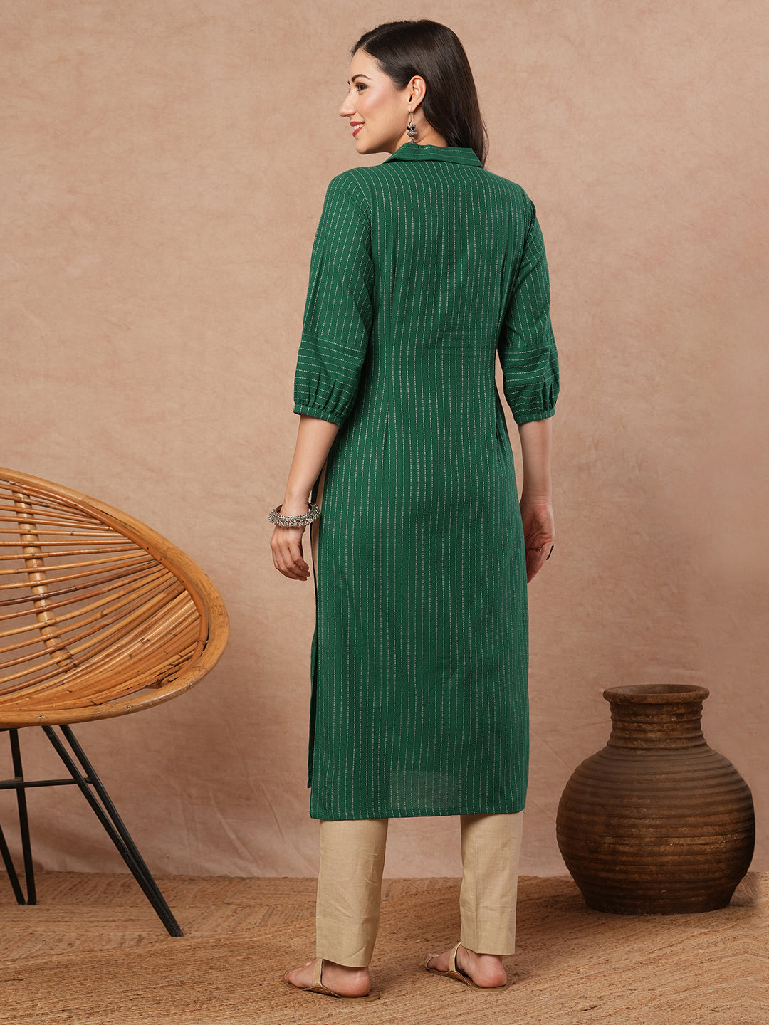 Straight fit kurta with collar and gathered sleeves with handwork on kantha stripe fabric.