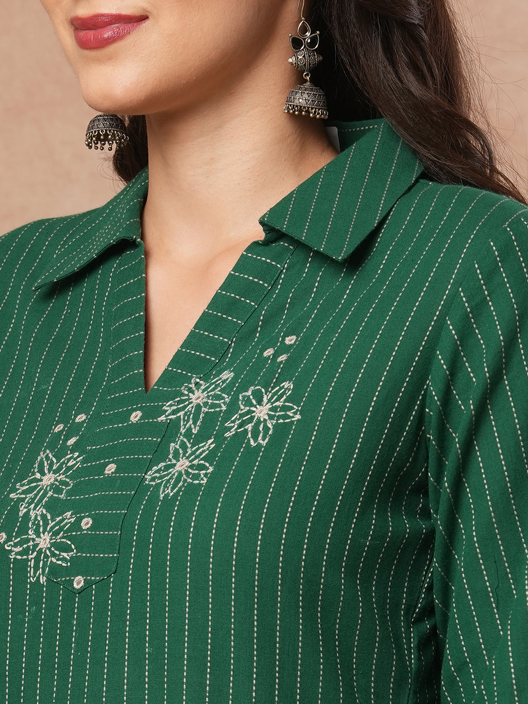 Straight fit kurta with collar and gathered sleeves with handwork on kantha stripe fabric.