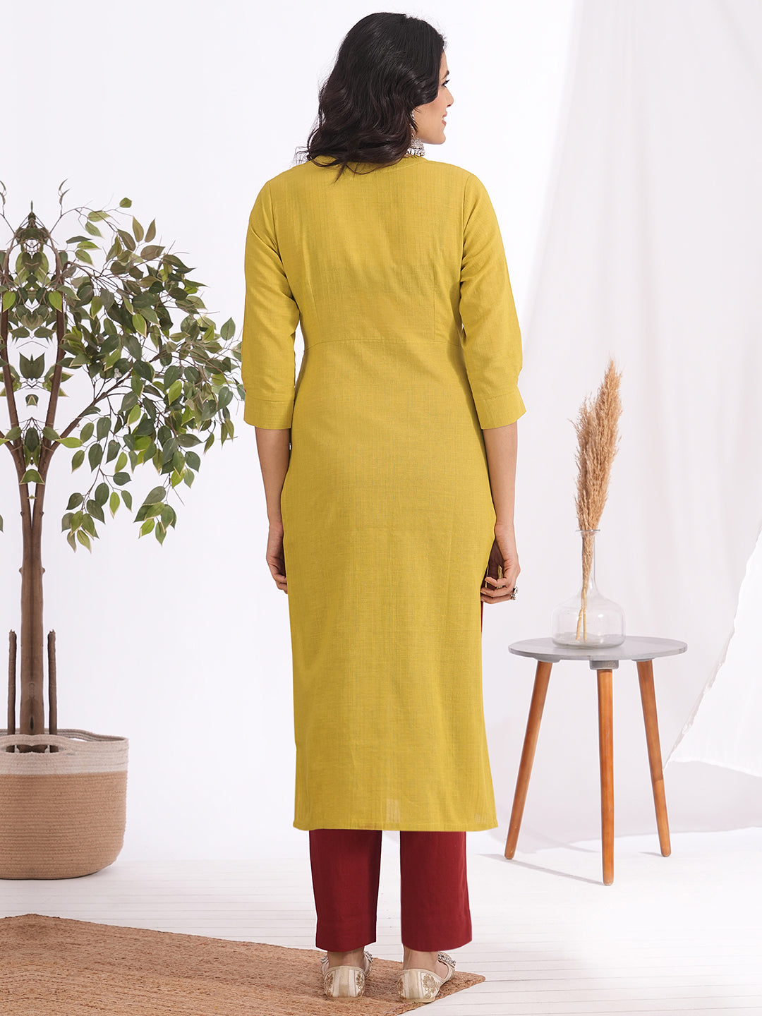 Straight fit kurta with smocking and mirrorwork neckline, shaped waistline with centre box pleat
