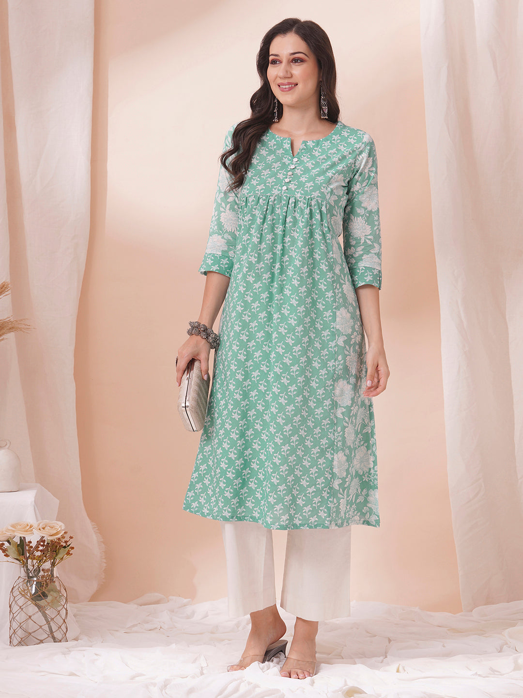An armhole princess A-line kurta with contrast print centre panels with under bust gathers in the front.