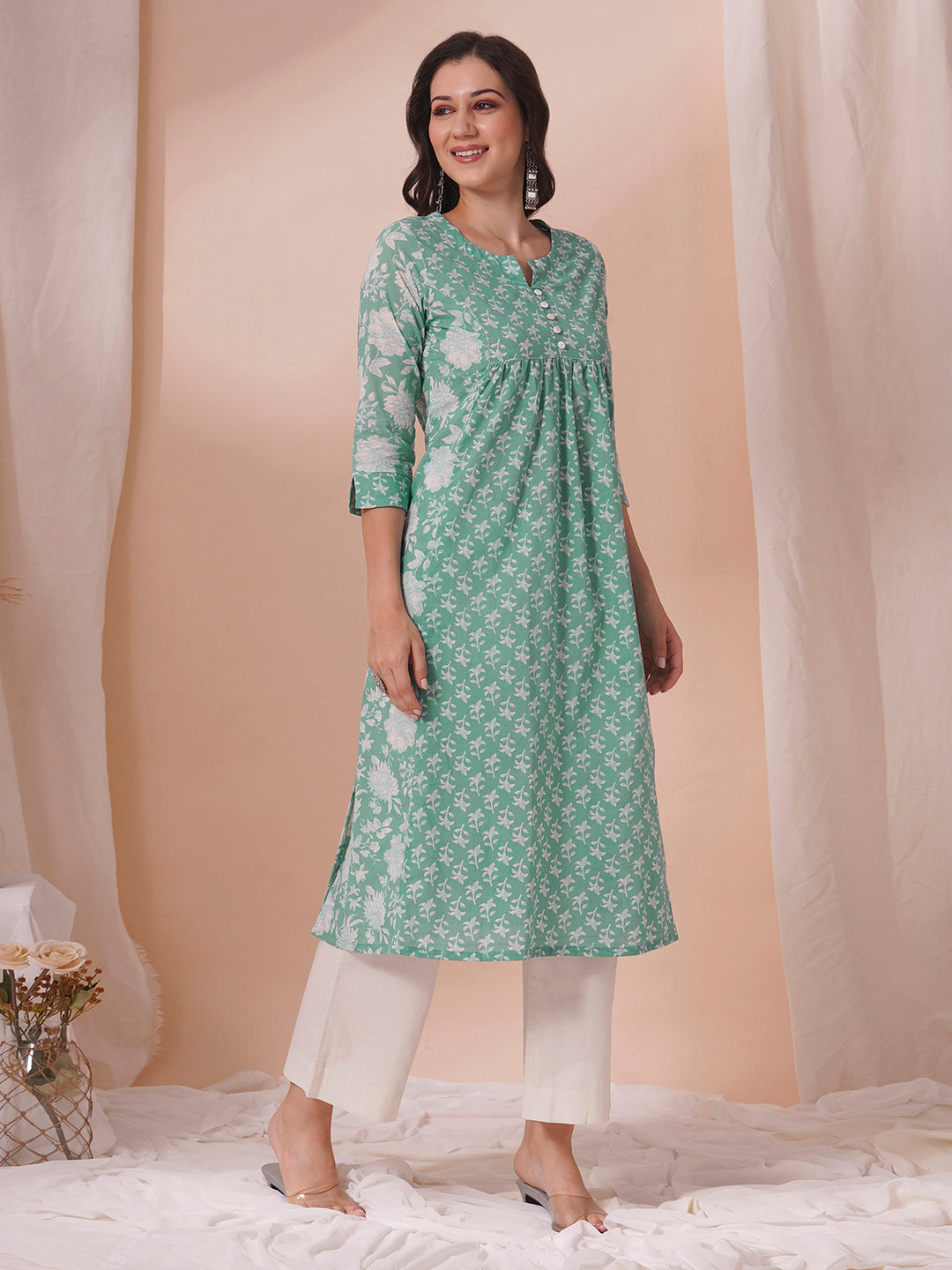 An armhole princess A-line kurta with contrast print centre panels with under bust gathers in the front.