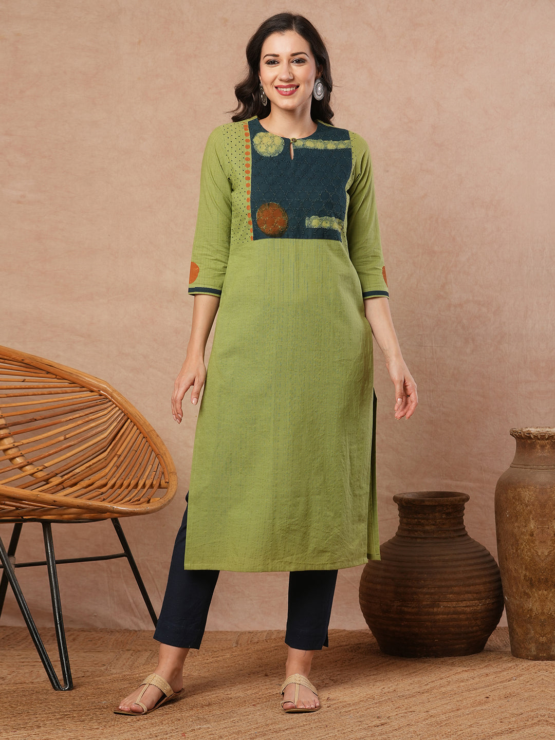 Straight fit kurta with borar fabric asymmetrical yoke and block print.