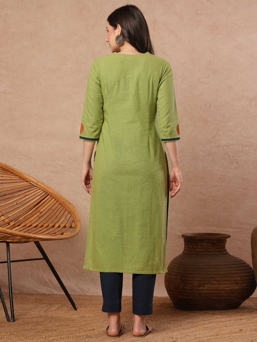 Straight fit kurta with borar fabric asymmetrical yoke and block print.