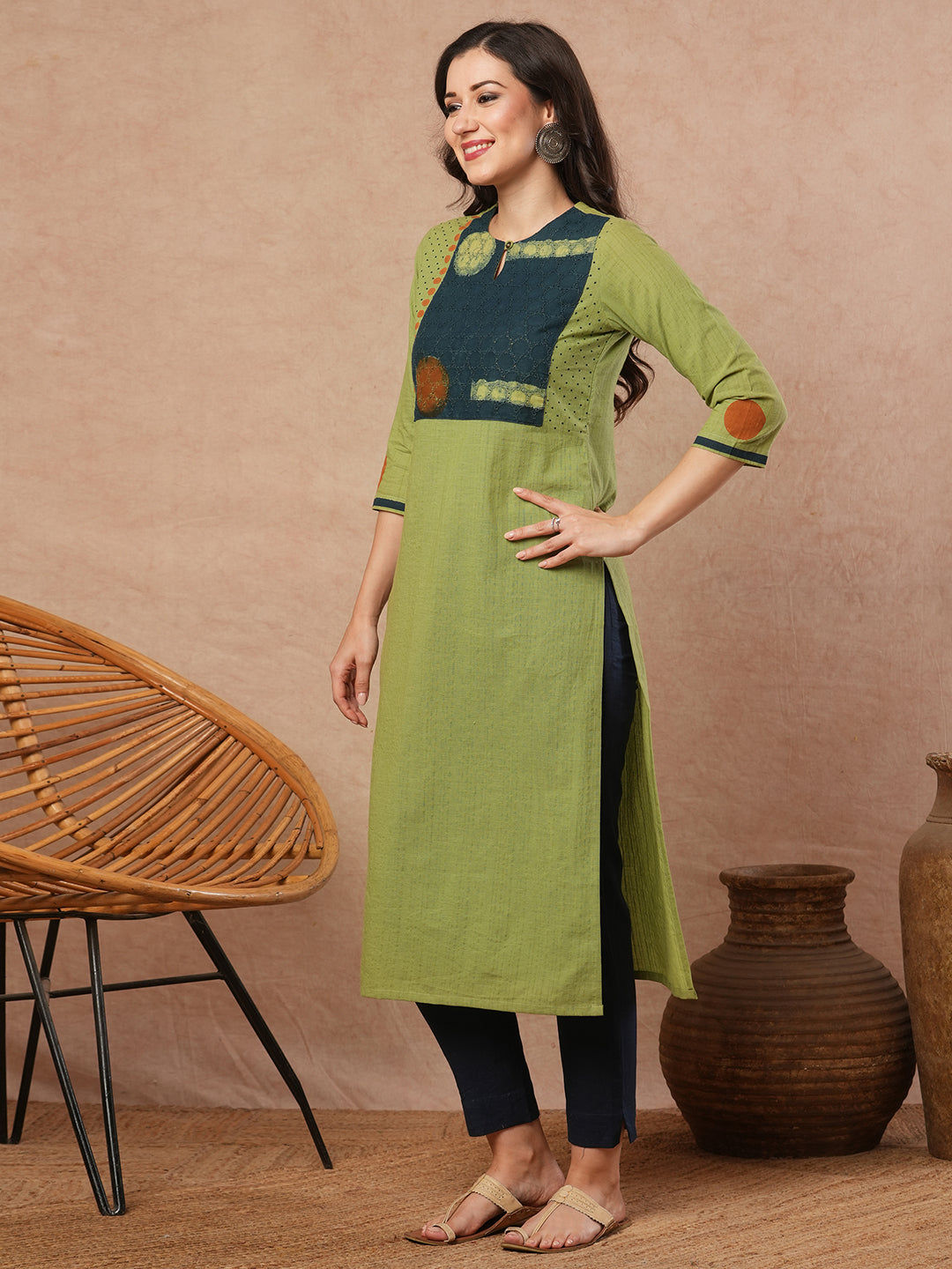 Straight fit kurta with borar fabric asymmetrical yoke and block print.
