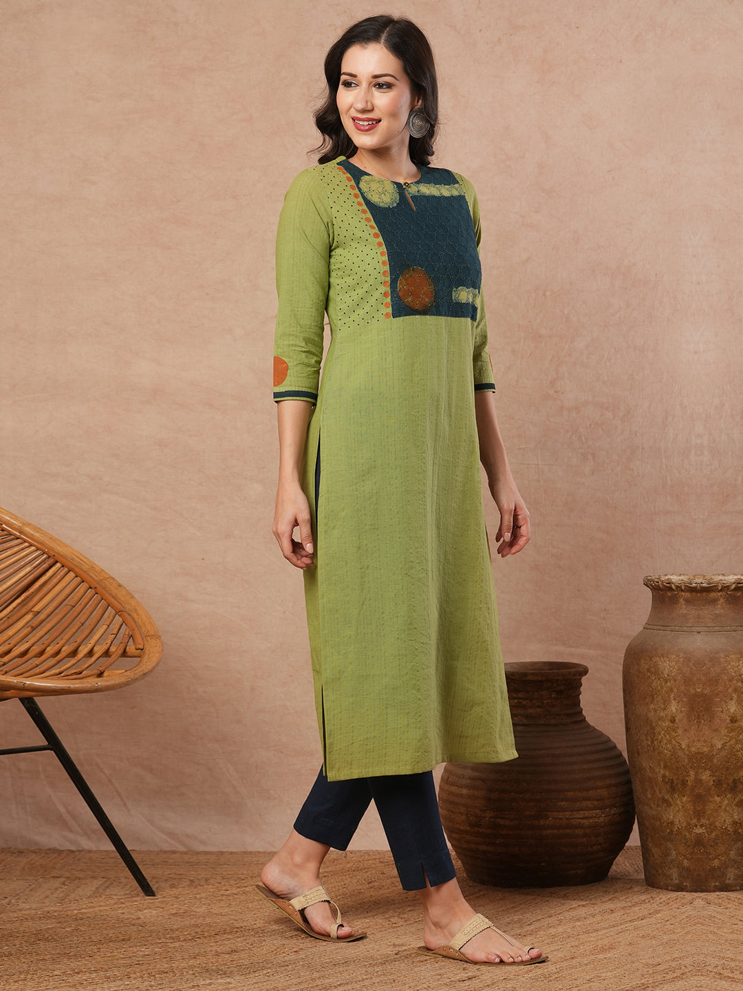 Straight fit kurta with borar fabric asymmetrical yoke and block print.