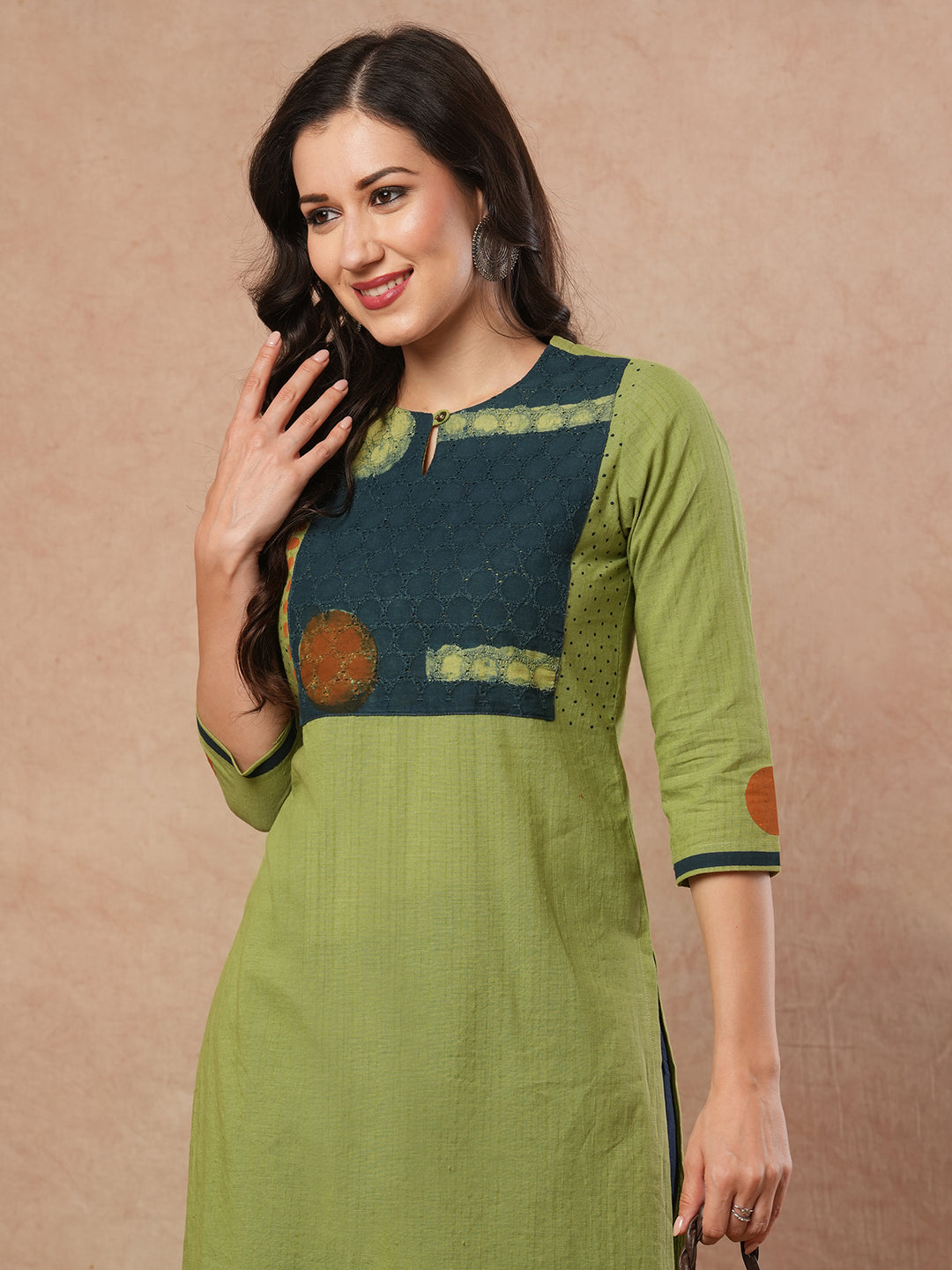Straight fit kurta with borar fabric asymmetrical yoke and block print.