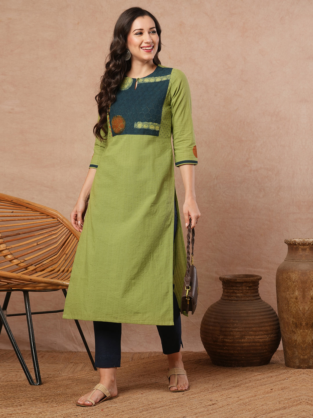 Straight fit kurta with borar fabric asymmetrical yoke and block print.