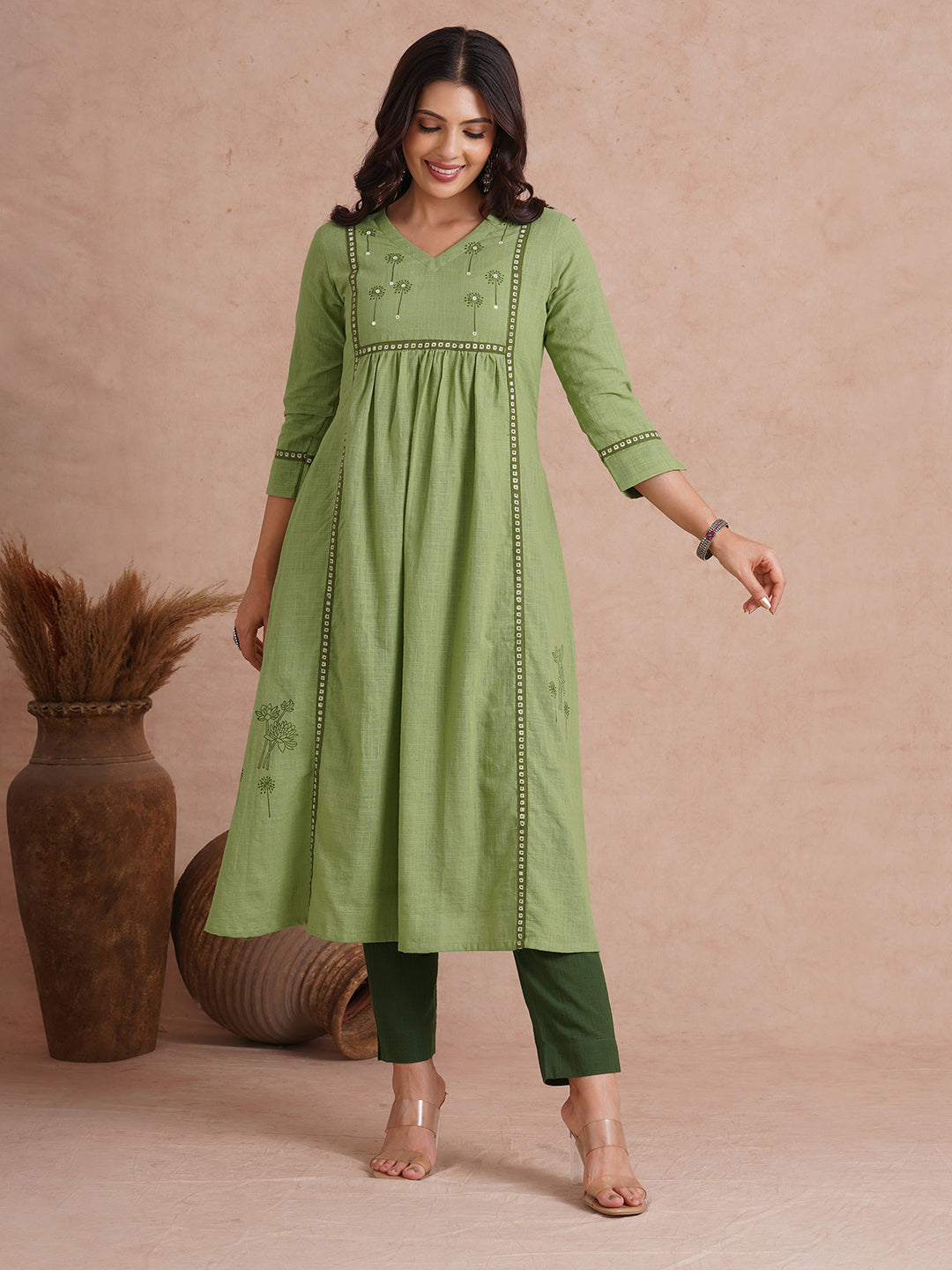 A-line kurta with contrast borders on seams and sleeves with block printed yoke.