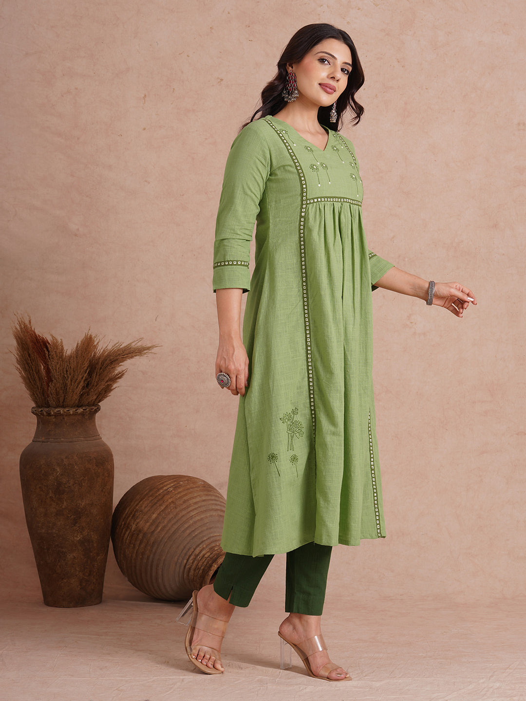 A-line kurta with contrast borders on seams and sleeves with block printed yoke.