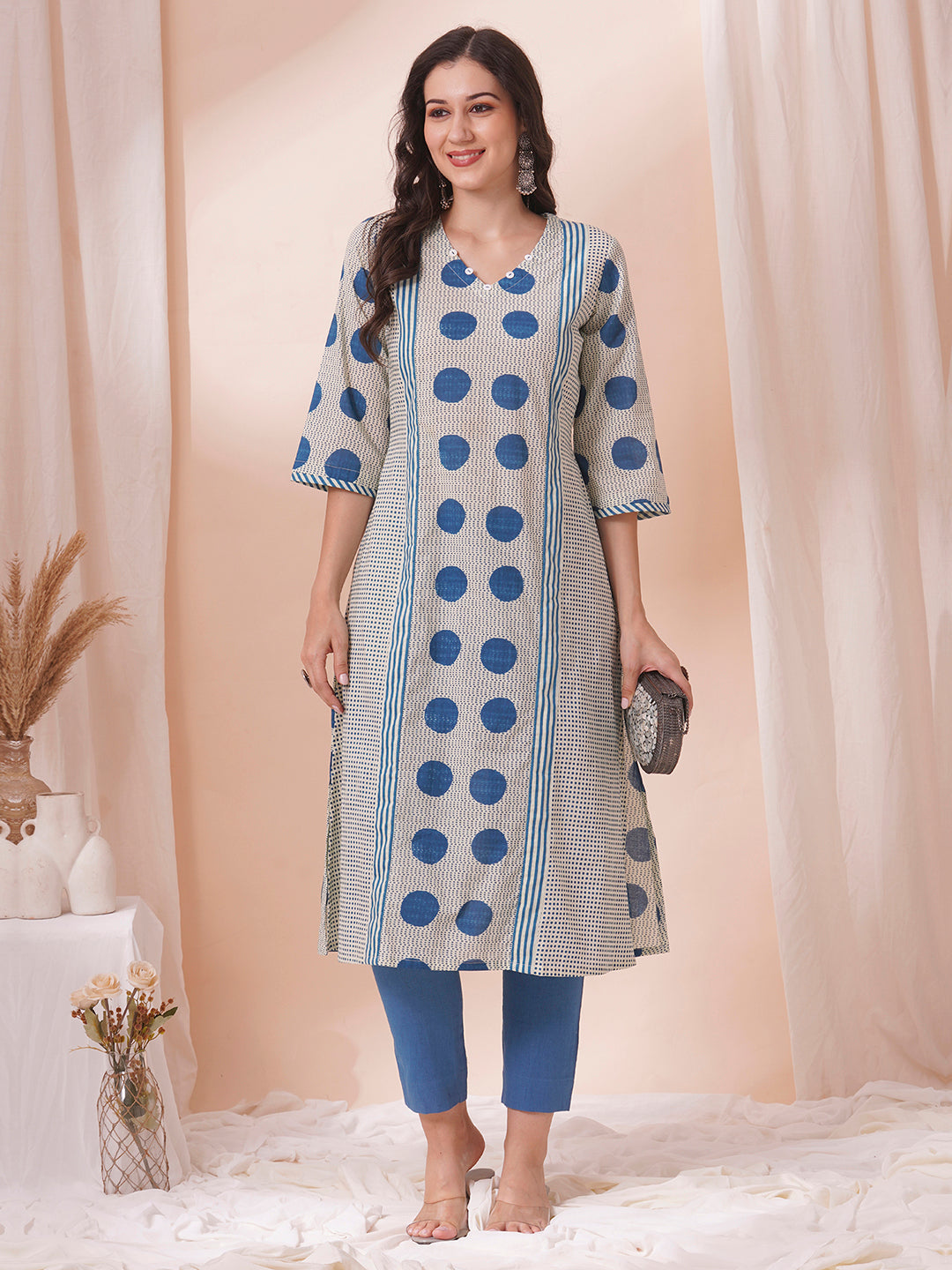 A-line print mix-match kurta with button detailing and bell sleeves.