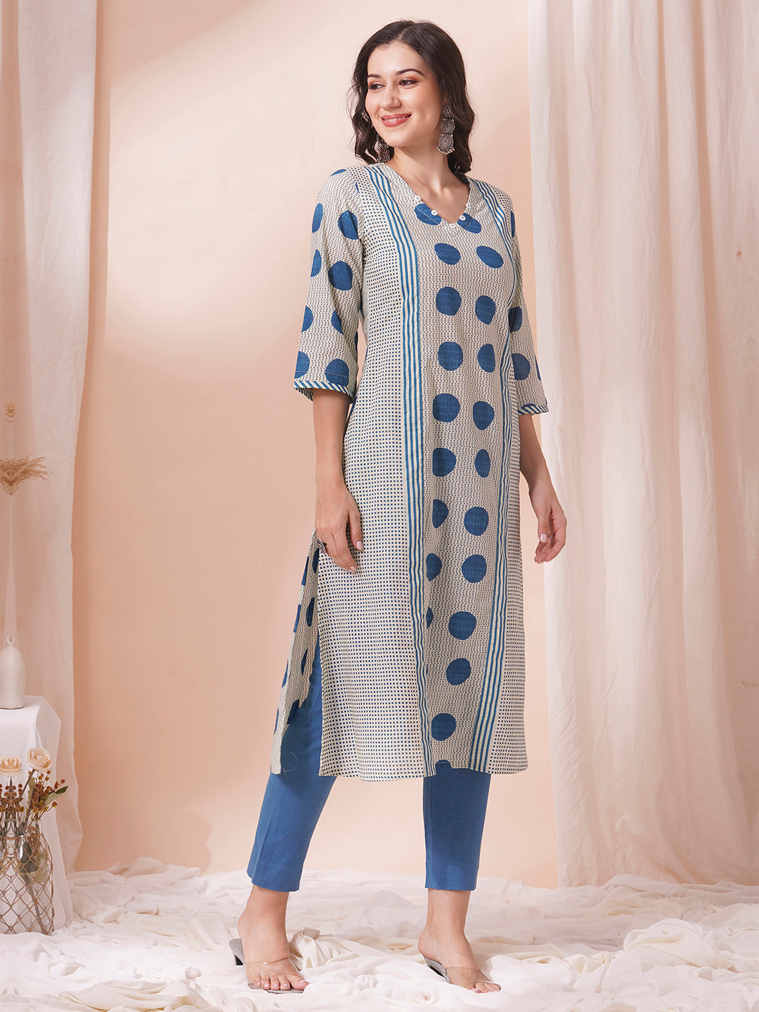 A-line print mix-match kurta with button detailing and bell sleeves.