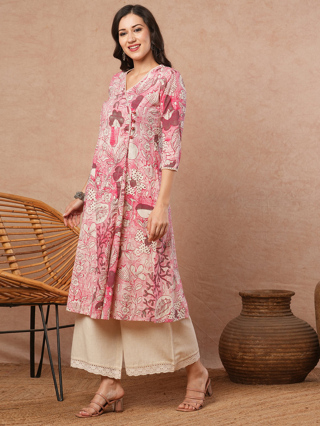 Printed A-line wrap around kurta with lace detailing.