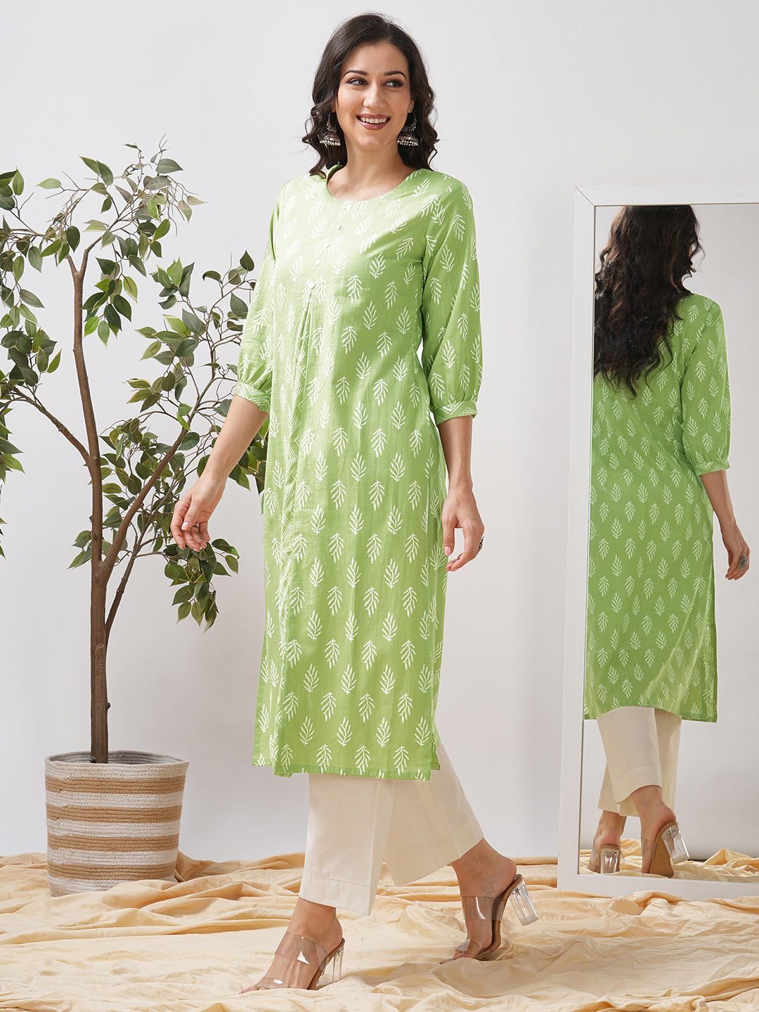 Straight fit kurta with cut and sew trim fabric centre pleat and gathered sleeves.