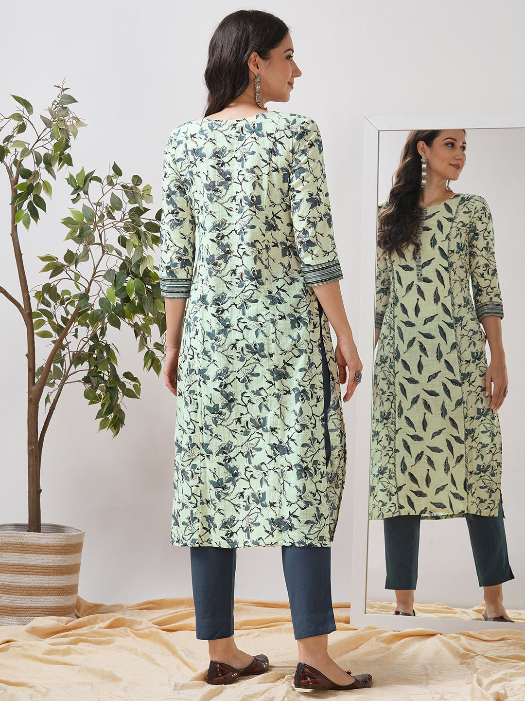 Straight fit shoulder princess kurta with piping between the seams and placket.