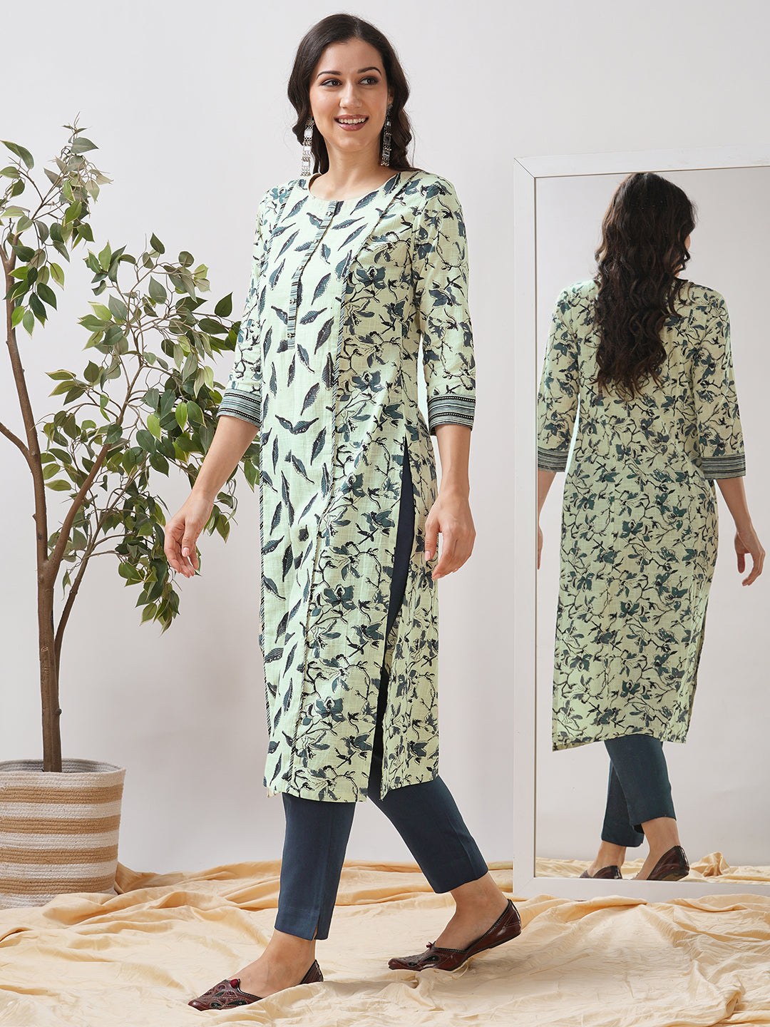 Straight fit shoulder princess kurta with piping between the seams and placket.