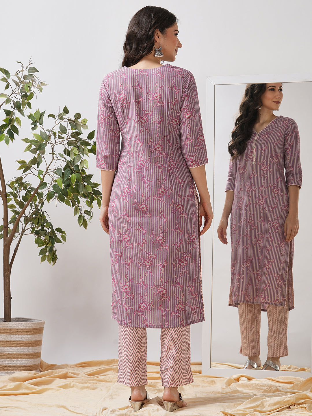 Straight kurta with piping detailing on neck, sleeves and side slits.