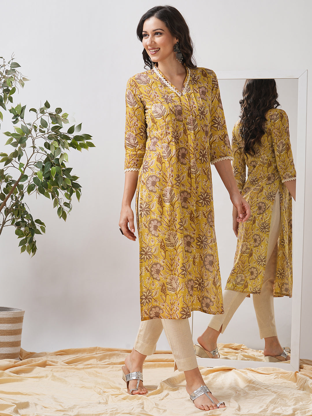 Mustard Yellow Floral Printed Straight Kurta with Lace Detailing.