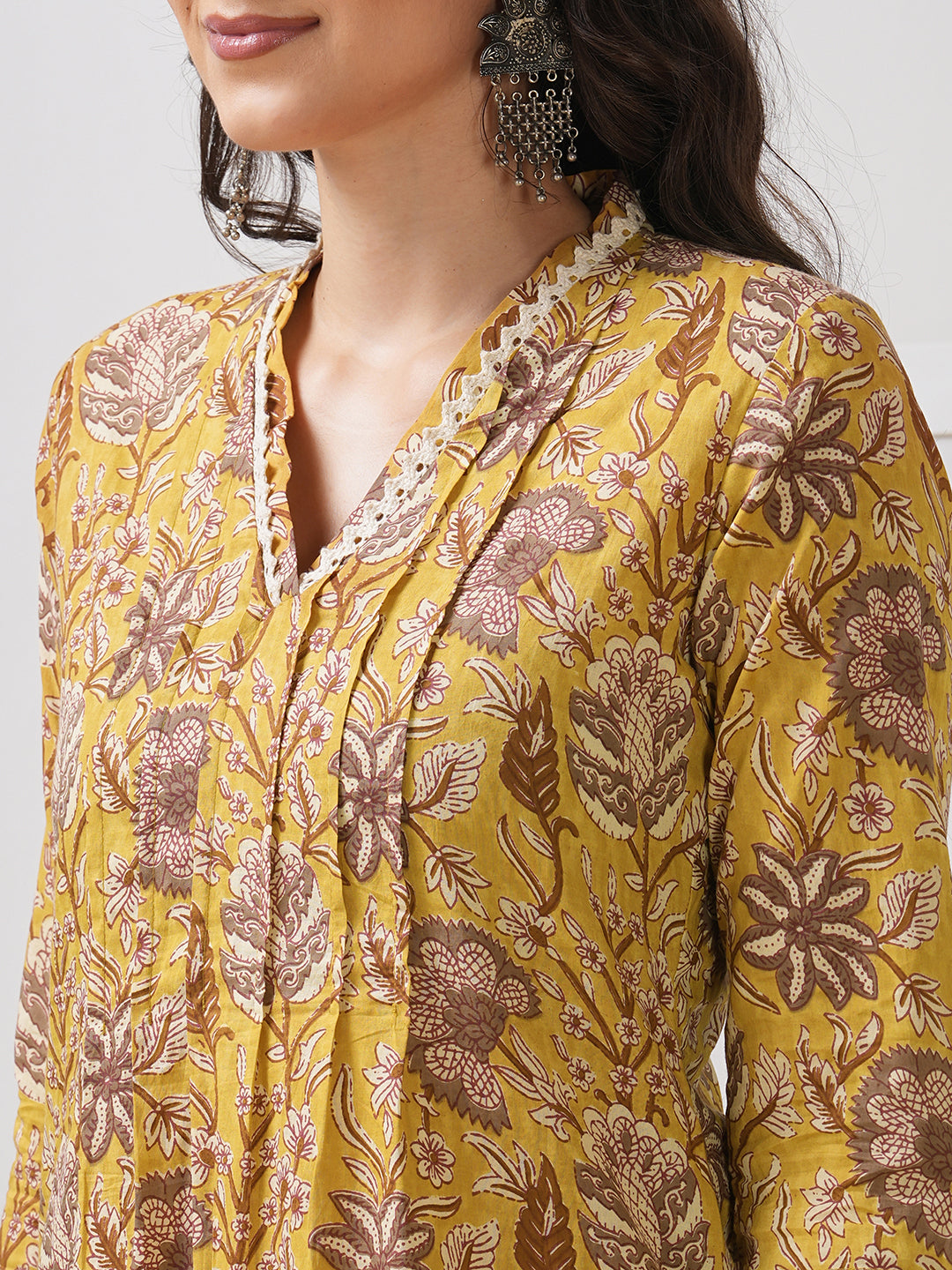 Mustard Yellow Floral Printed Straight Kurta with Lace Detailing.