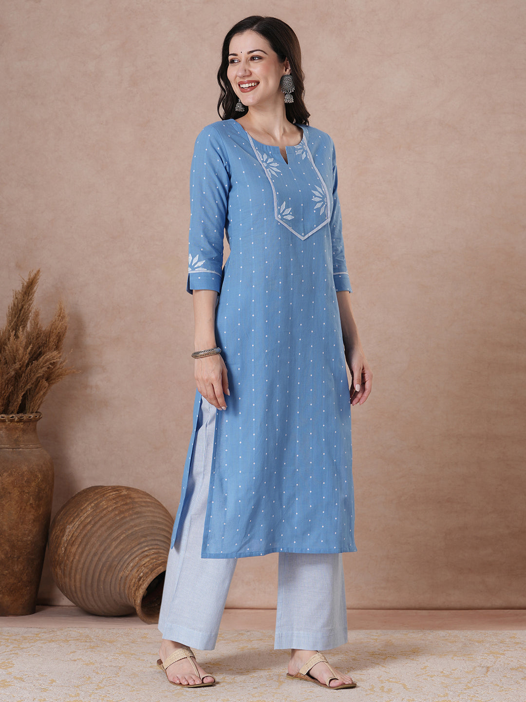 JOYLAND - Straight fit cotton kurta with a shaped block printed yoke and striped piping detail, paired with striped palazzo