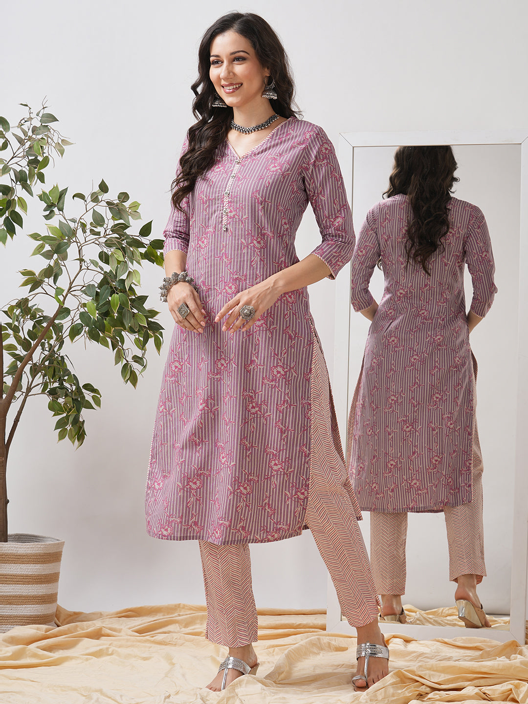 Straight kurta set with piping detailing on neck, sleeves and side slits paired with pant.