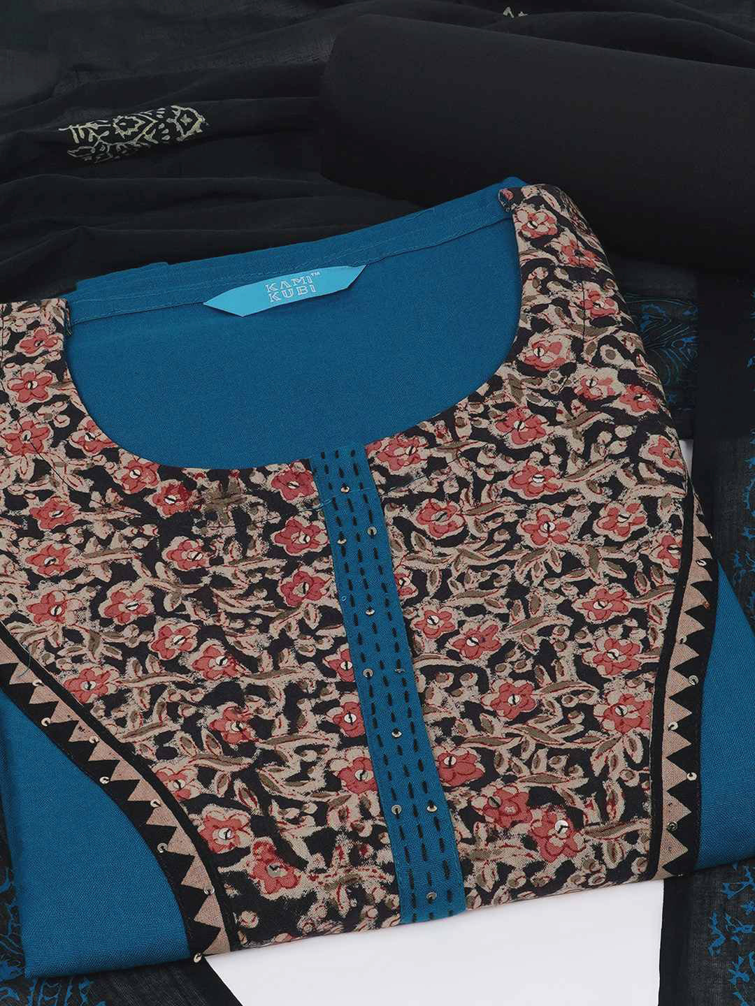 3-piece unstitched set with intricate floral patterns, paired with a contrasting black dupatta & plain bottom.(Blue)