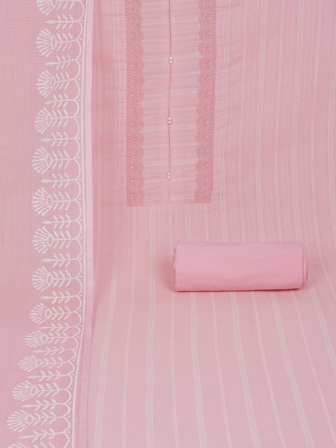 A light pink unstitched suit set with intricate top paired with plain bottom and Kota doria dupatta.