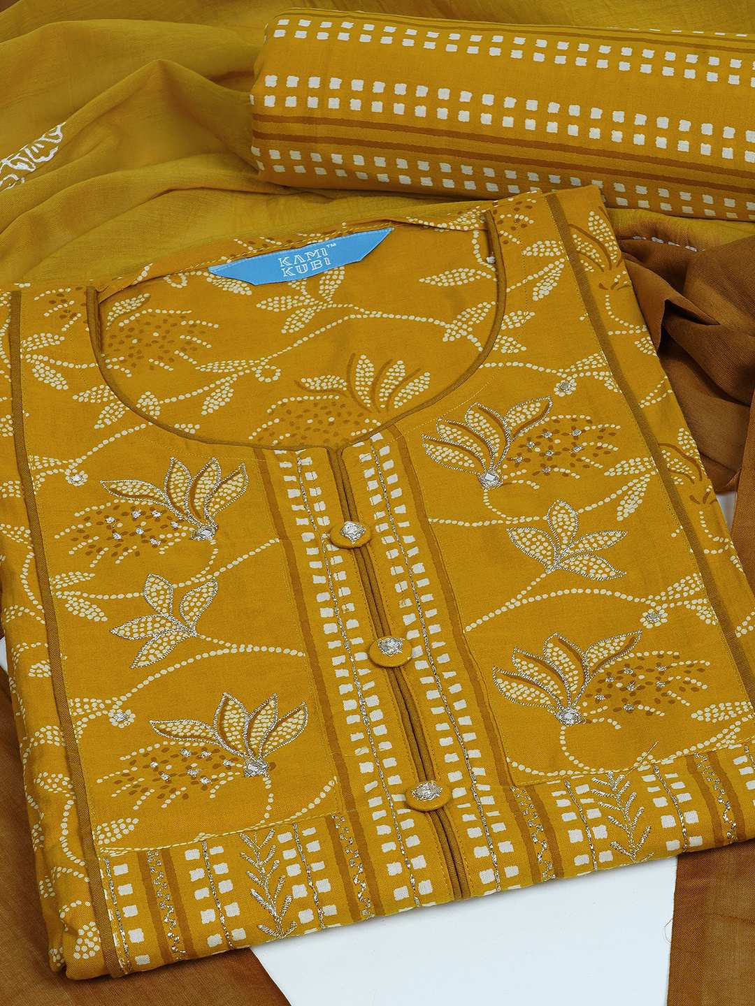 3-piece printed kurta set paired with printed bottoms and a beautifully block-printed mul dupatta.(Yellow)