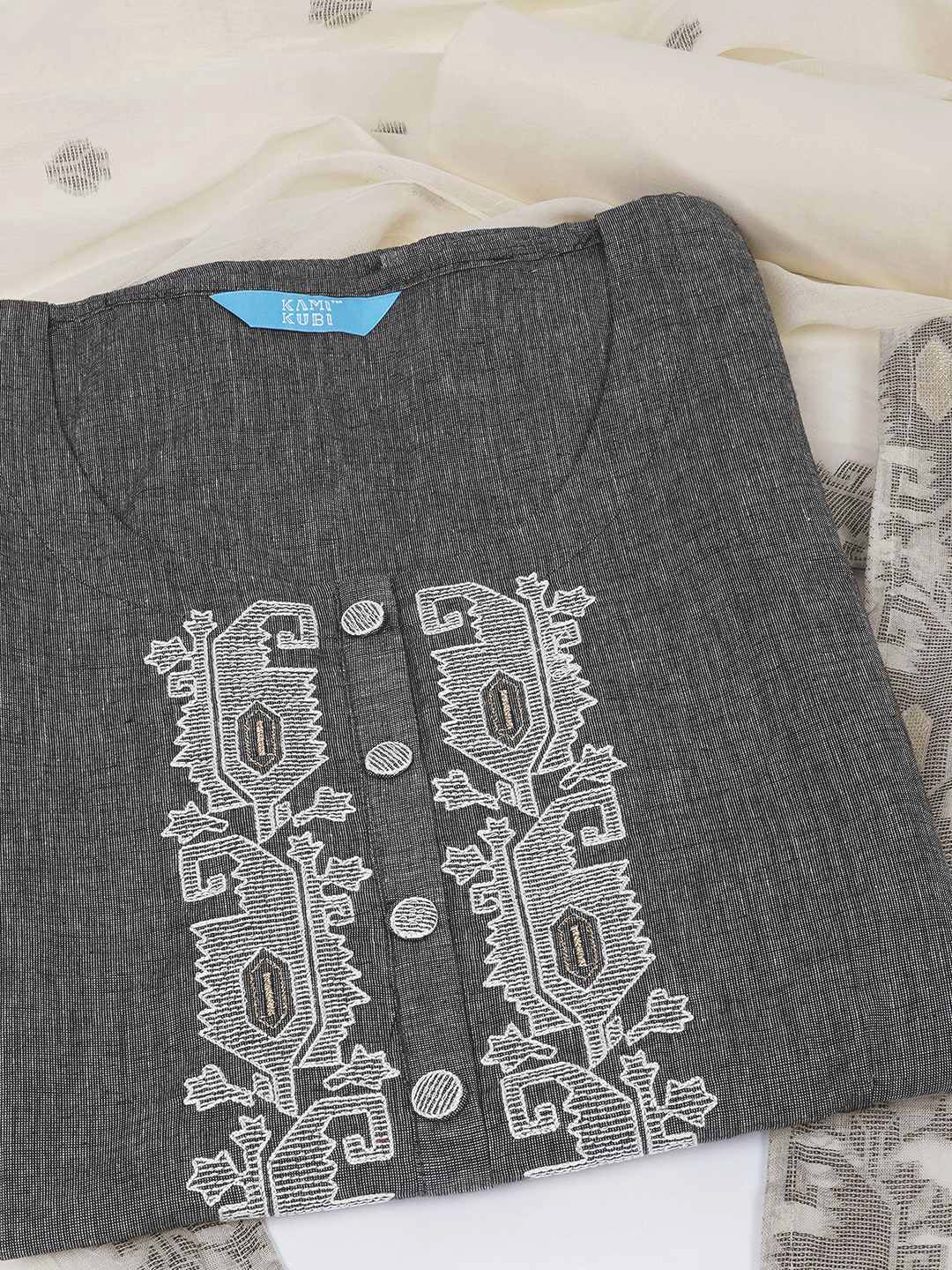 3-piece unstitched set features a black embroidered top paired with a soft cream dupatta showcasing subtle woven motifs.