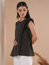 Black flared top in chequered cotton fabric with hand embroidered running stitch