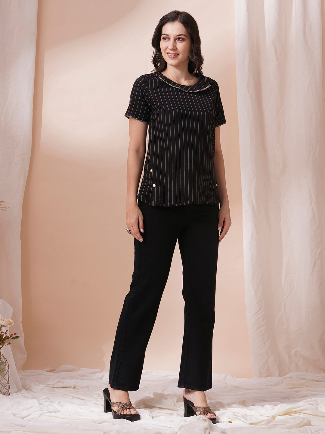 Striped cotton top with constructed collar and button detailing with hand embroidery.