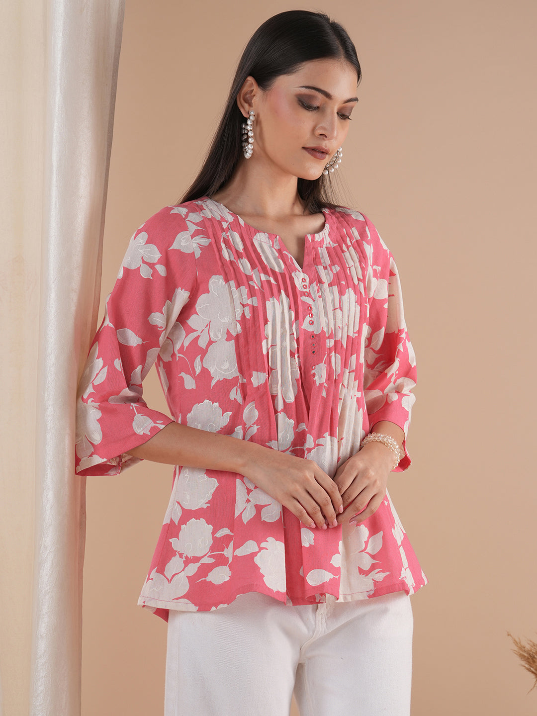 Printed short top with tucks in the front with mirror work and bell sleeves