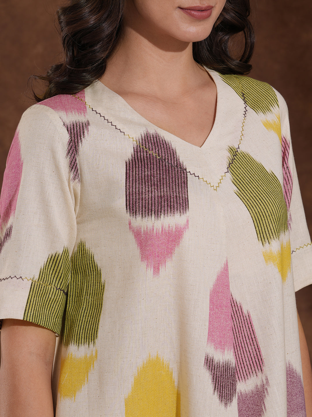 V-Neck cotton flex shirt dress in an 'ikat' weave inspired print with handwork.