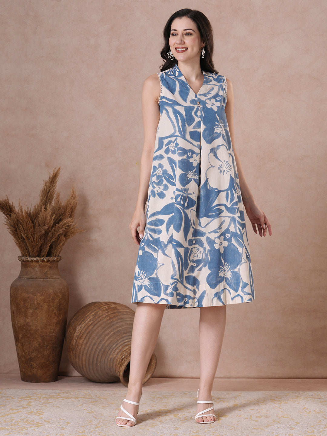 Blue Floral Print A-Line Dress with button placket.