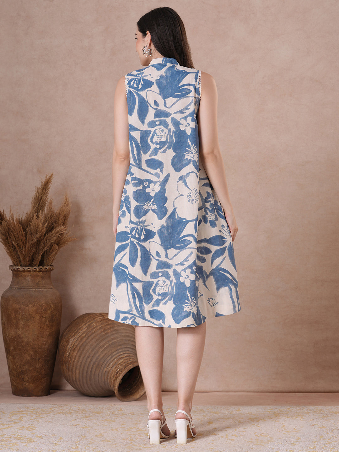 Blue Floral Print A-Line Dress with button placket.