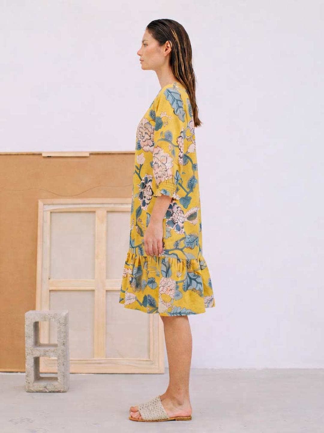 JOYLAND-A-Line Cotton Floral Printed Dress with Tiered Hem & Smocked Sleeves.