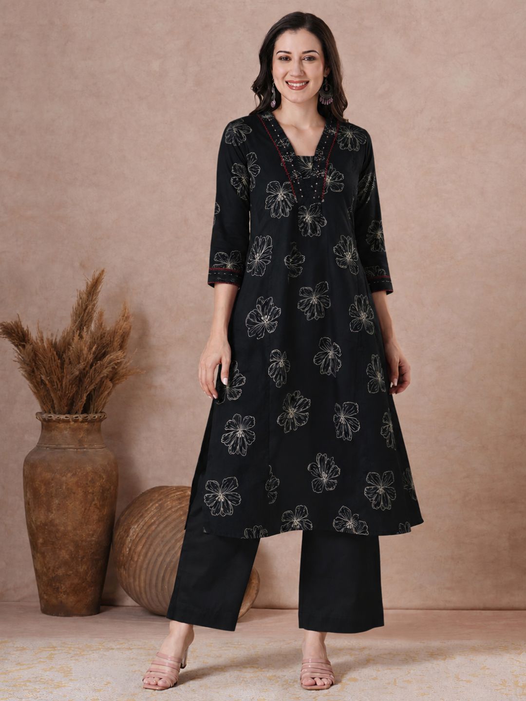 Pocketed A-Line Cotton Printed Kurta with Smocking & Hand Work.