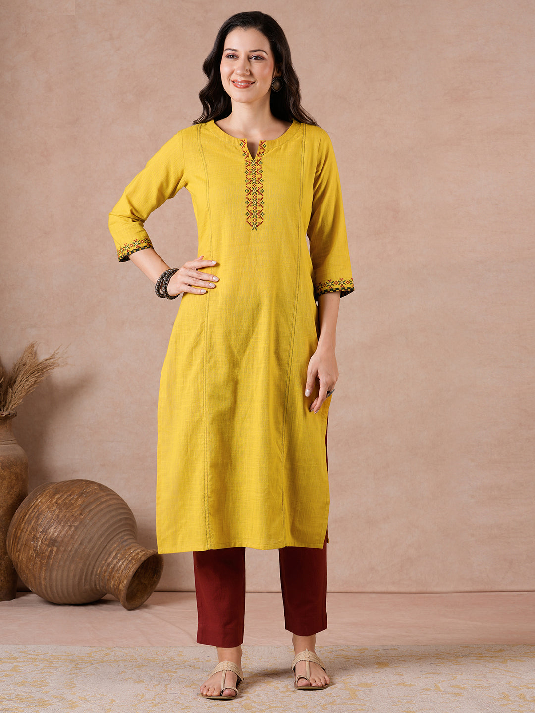 Straight Fit Cotton Slub Kurta with Rabari Embroidery & Block Print Trim.