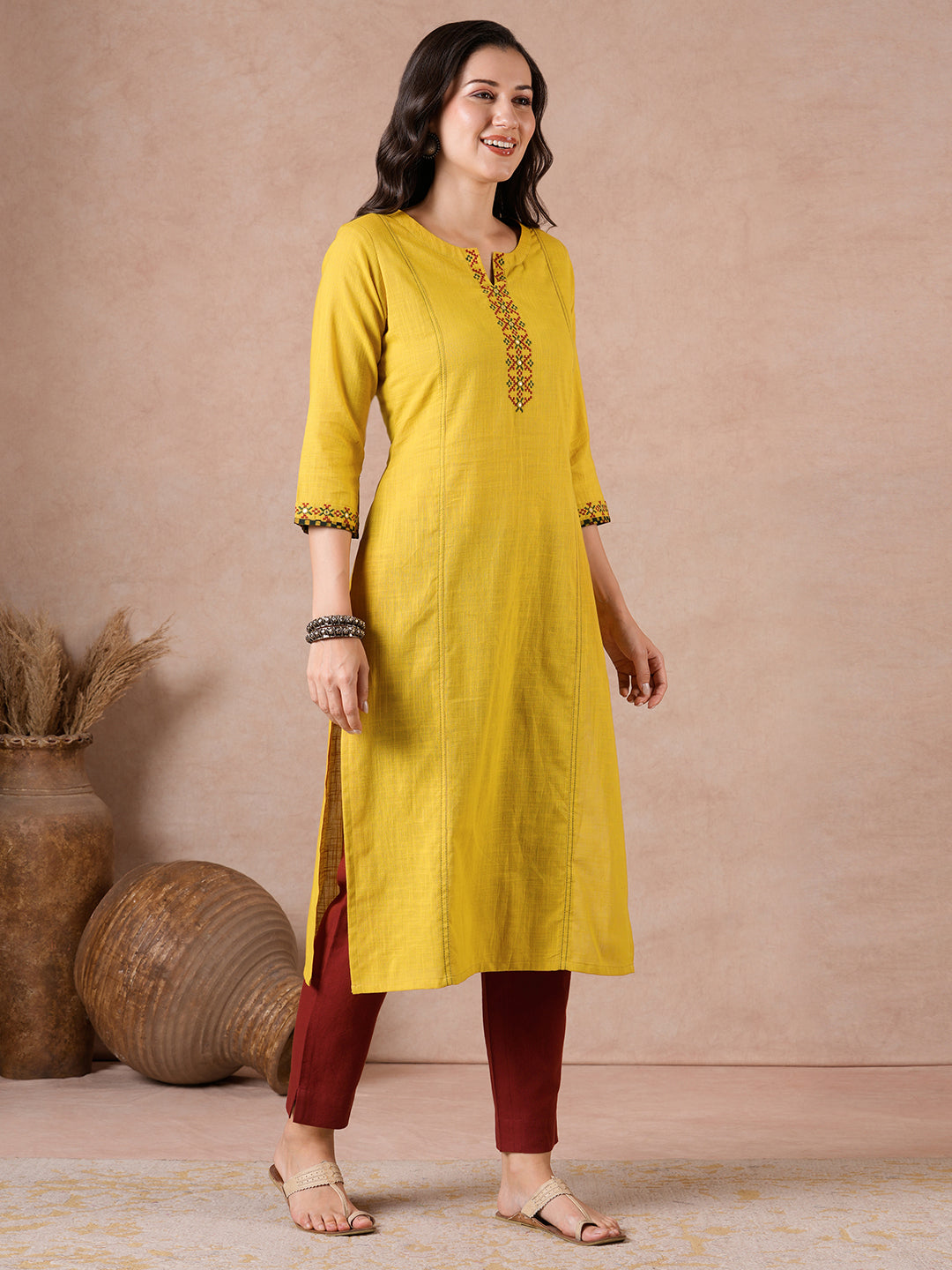 Straight Fit Cotton Slub Kurta with Rabari Embroidery & Block Print Trim.