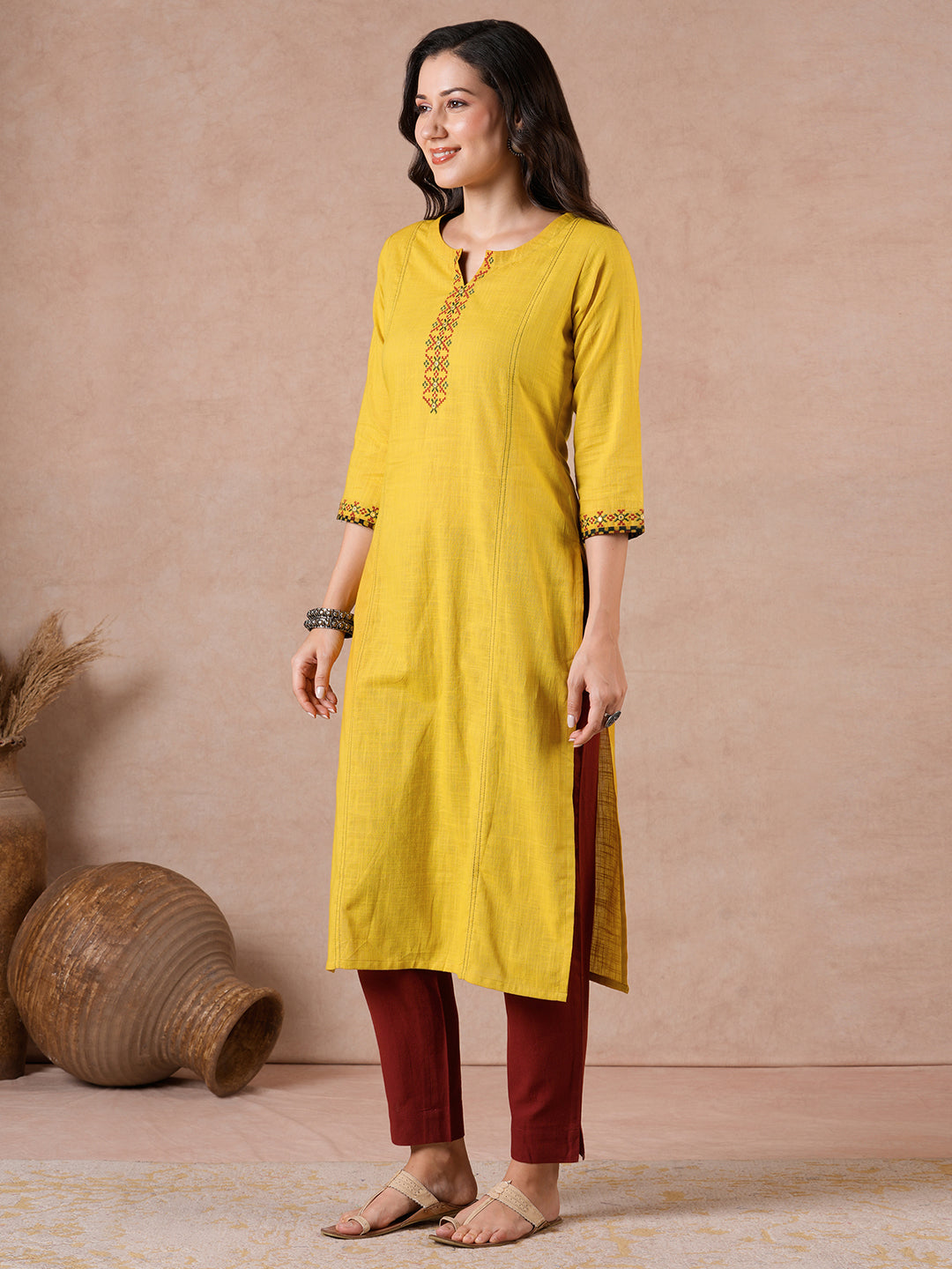 Straight Fit Cotton Slub Kurta with Rabari Embroidery & Block Print Trim.