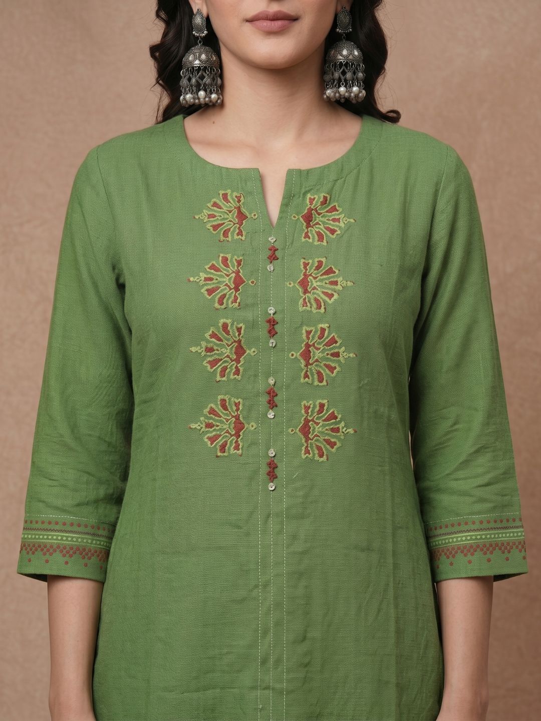 Straight Fit Cotton Kurta with Intricate Embroidered Yoke & Printed Sleeve Detail.